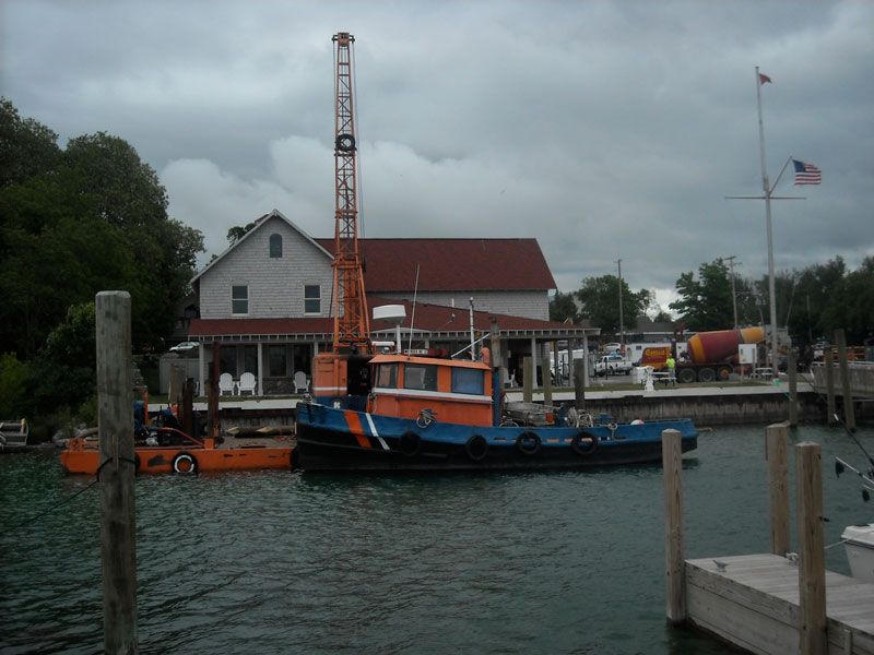 Tug and barge in Leland Harbor