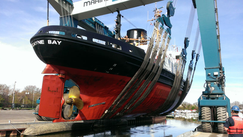 Photograph: USCGC BISCAYNE BAY lifted by a gigantic Travel-Lift.