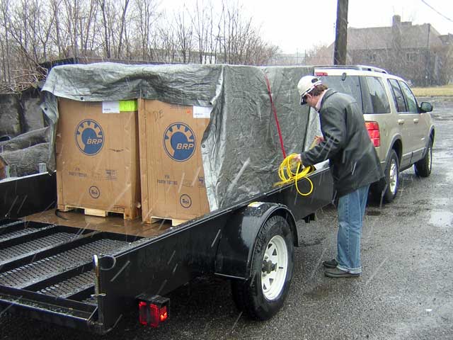 Photo: New E-TEC motors in crates on trailer