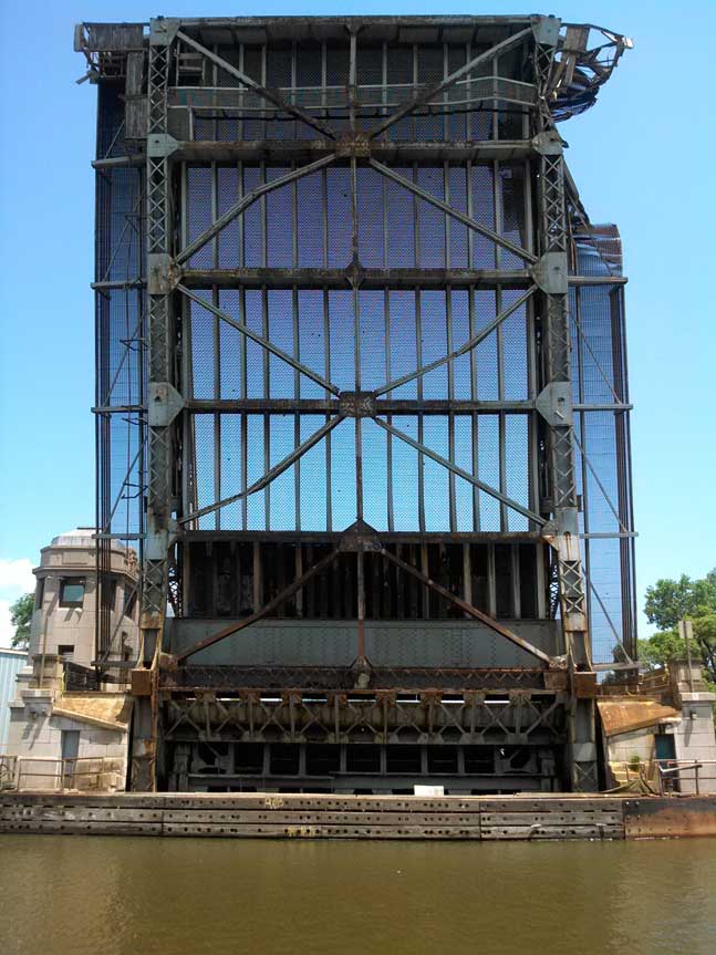 Photo: view of East draw of Jefferson Avenue bridge over Rouge River as seen from the rivers side and below.