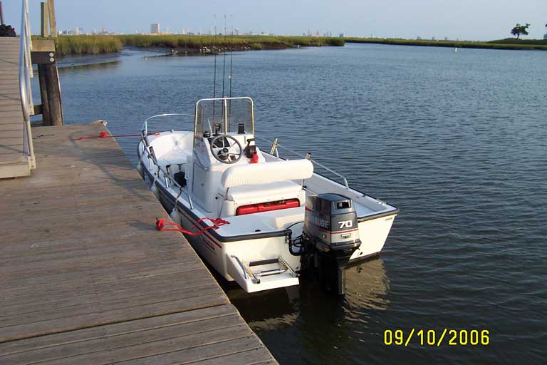 Photo: Boston Whaler DAUNTLESS 15 docked at Faunce Landing Road public boat ramp in Absecon, NJ. Atlantic City is off in the distance.