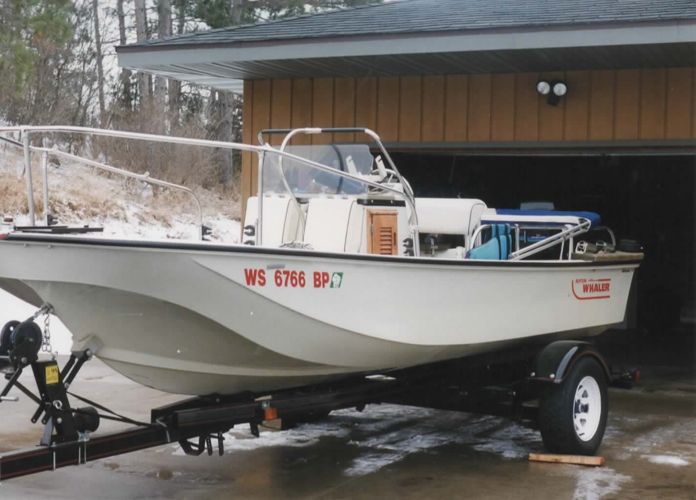 Boston Whaler MONTAUK with added gunwale boards at stern.