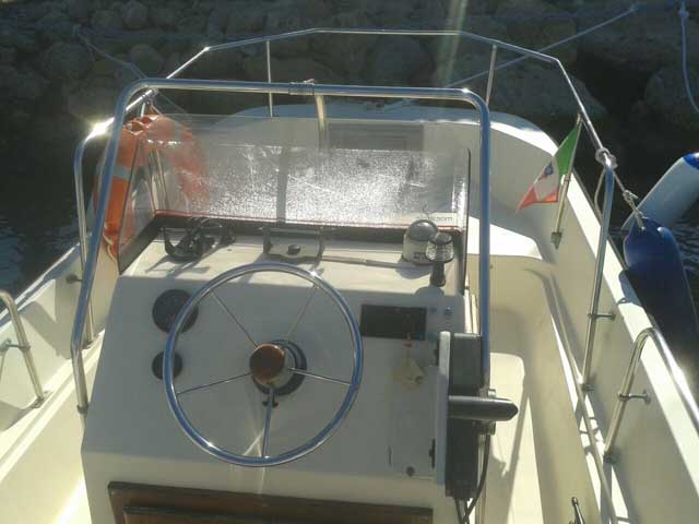 View of console of 17-foot center console boat that resembles a Boston Whaler MONTAUK.