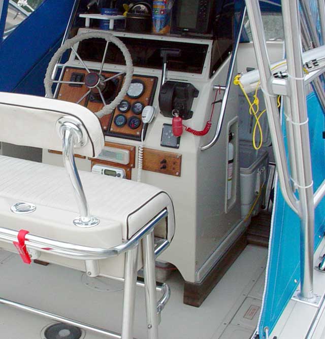 Photo: Boston Whaler center console raised on wooden risers.