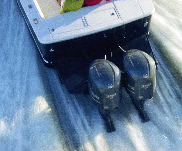 Photo: Overhead view of boat showing outboard engine A-V plate orientation.