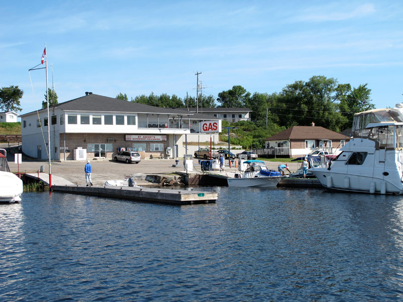 Photo: Boats at the fuel dock, St. Amanats Marina, Britt, Ontario.