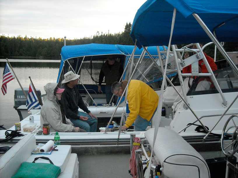 Photo: Boston Whaler boats rafted and anchored in Chippewa Harbor,  Isle Royale.