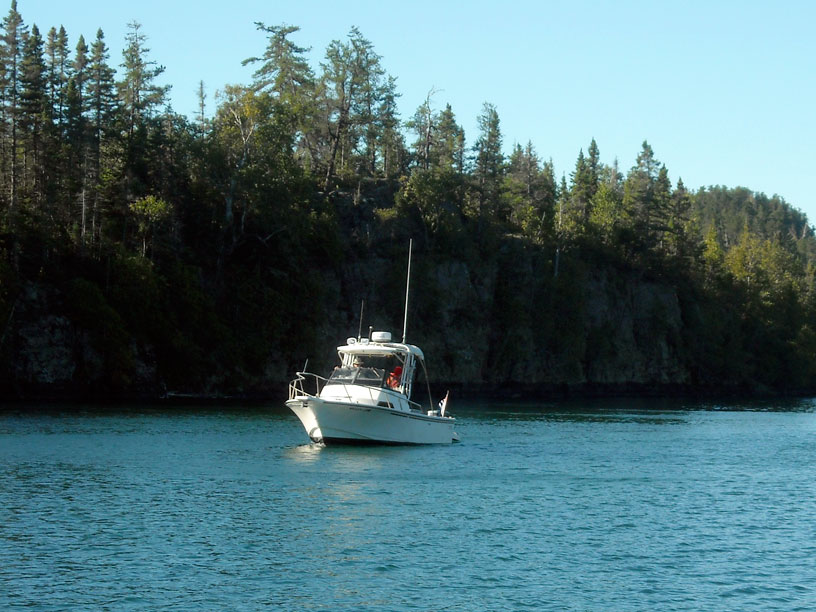 Photo: Boston Whaler 23 Walkaround HOLLY MARIE departing Chippewa Harbor, Isle Royale, Lake Superior.