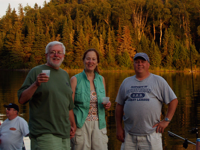 Photo: Jim Hebert, Chris Wilson, and Kevin Albus at dusk at Chippewa Harbor, Isle Royale, Lake Superior.