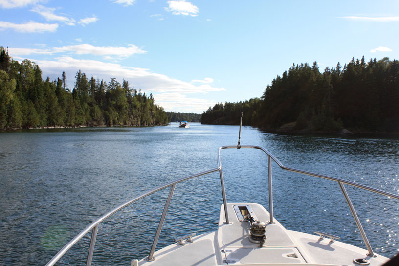 Photo: View from cockpit towards bow, entering Chippewa Harbor, Isle Royale, Lake Superior.