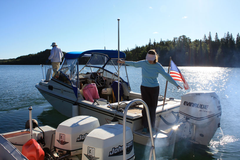 Photo: Boston Whaler boats un-tie from their raft in Chippewa Harbor, Isle Royale, Lake Superior.