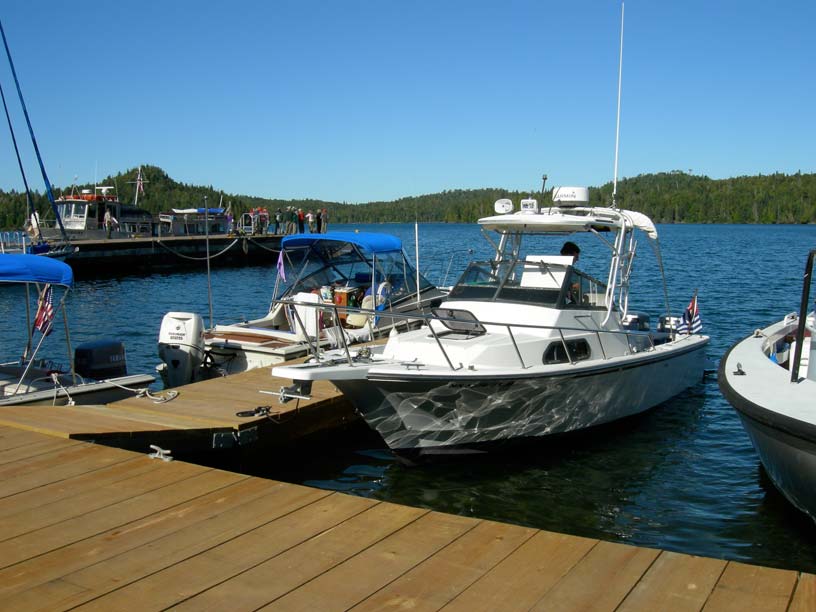 Photo: Boston Whaler boats at dock, Washington Harbor, Isle Royal, Lake Superior.