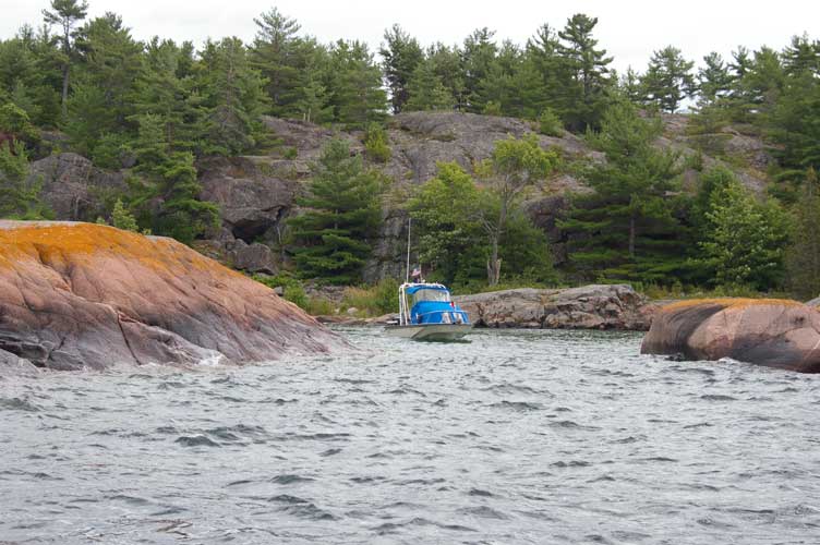 Photo: GAMBLER explores a very small anchorage on Porcupine Island
