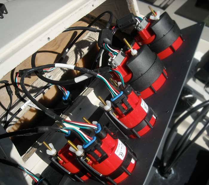 Photo: Rear view of instrument panel shows modular wiring between gauges