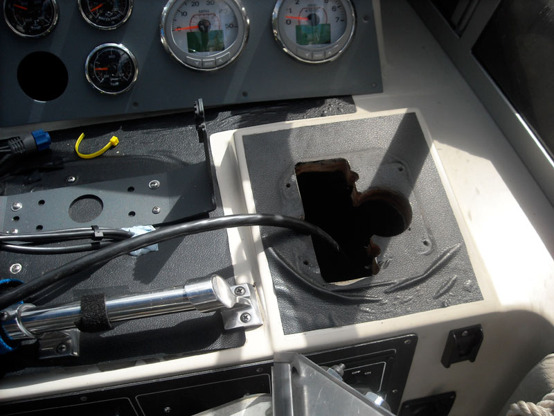 Photo: Helm area with old controls removed.