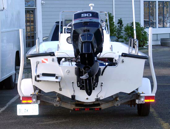 Photo: Rear view of all-bunk trailer showing low position of boat